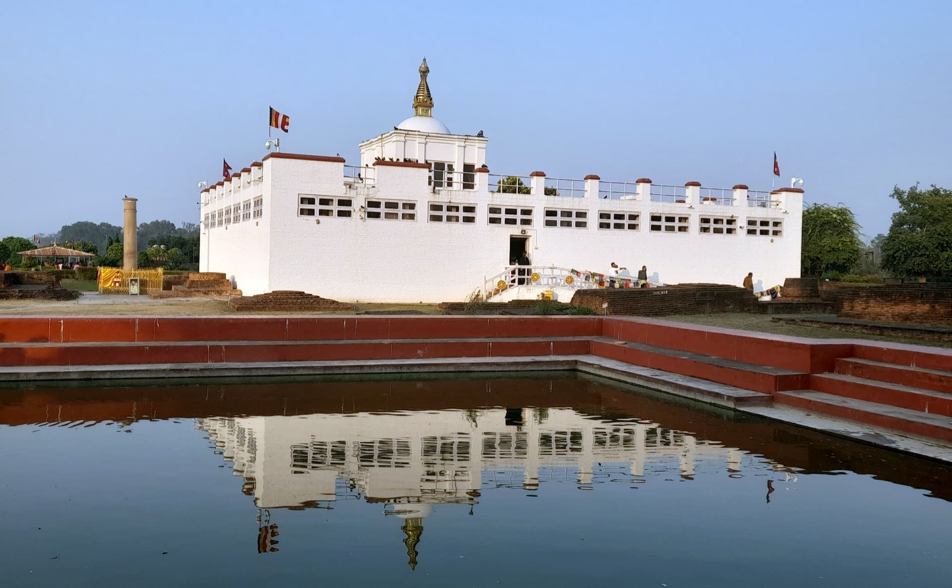 Maya Devi Temple at Lumbini Nepal reflected in sacred water for Terai Region destination card